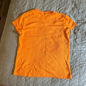 A New Day ripped shirts